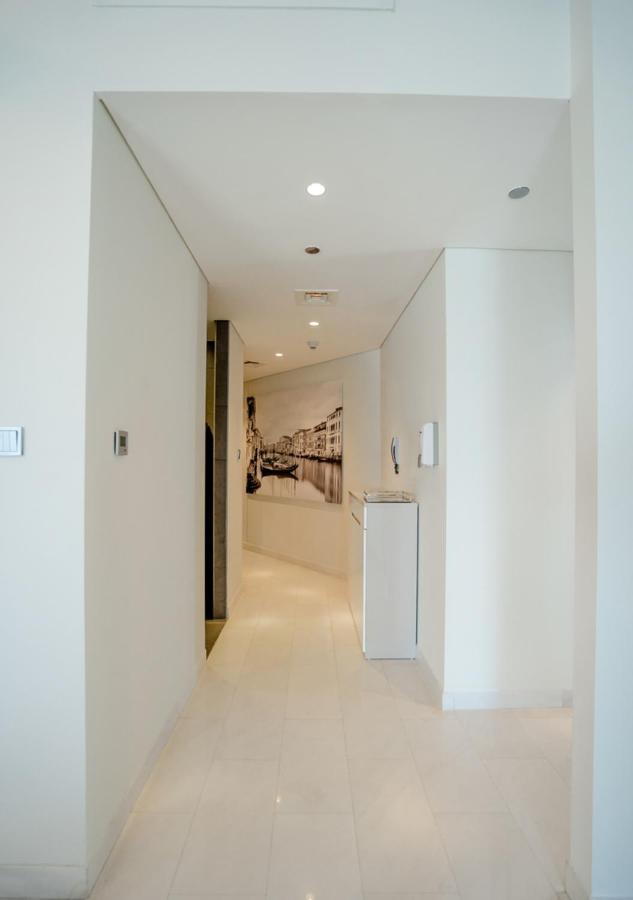 Nasma Luxury Stays - Cayan Tower Dubái Exterior foto