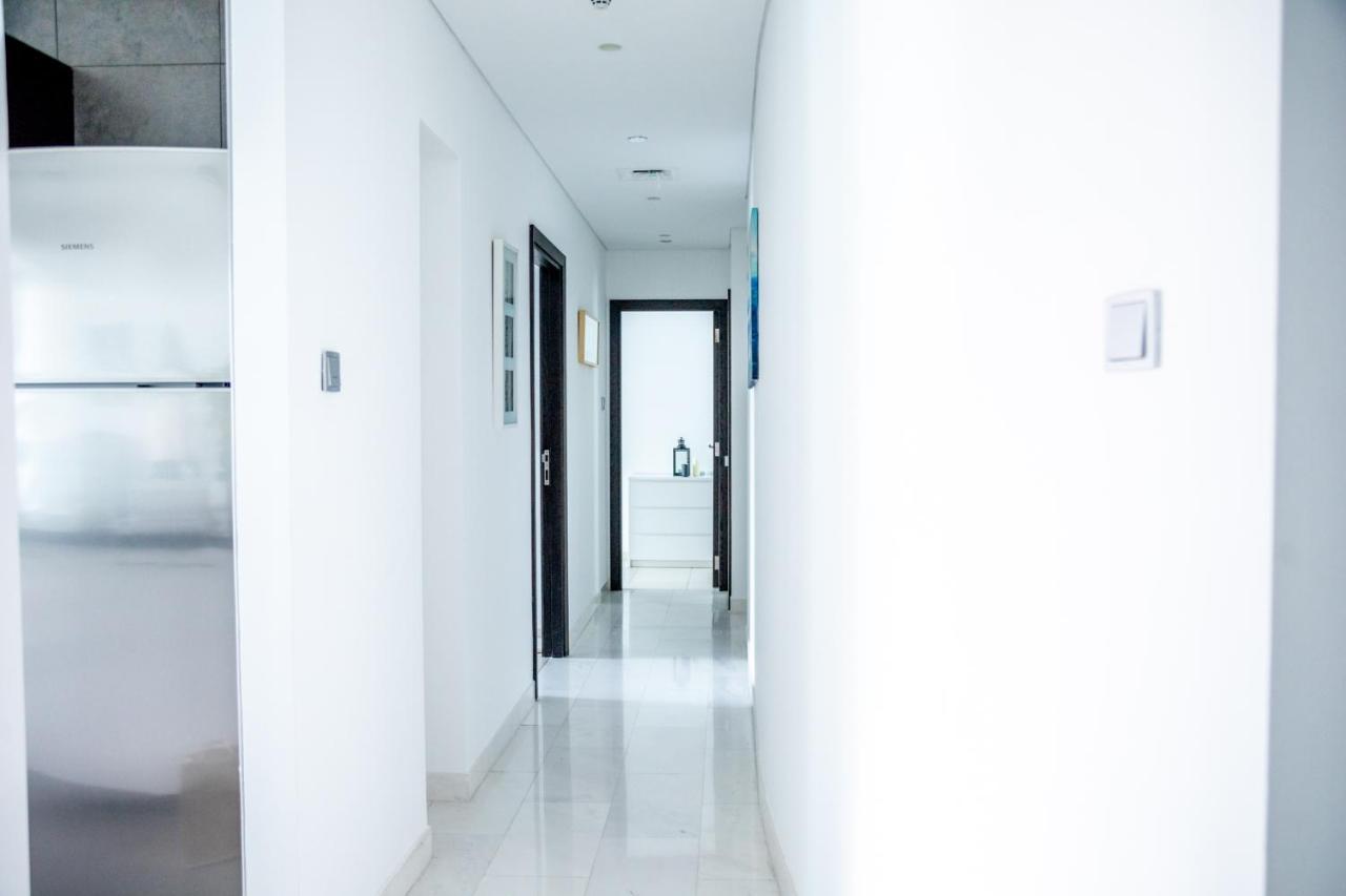 Nasma Luxury Stays - Cayan Tower Dubái Exterior foto